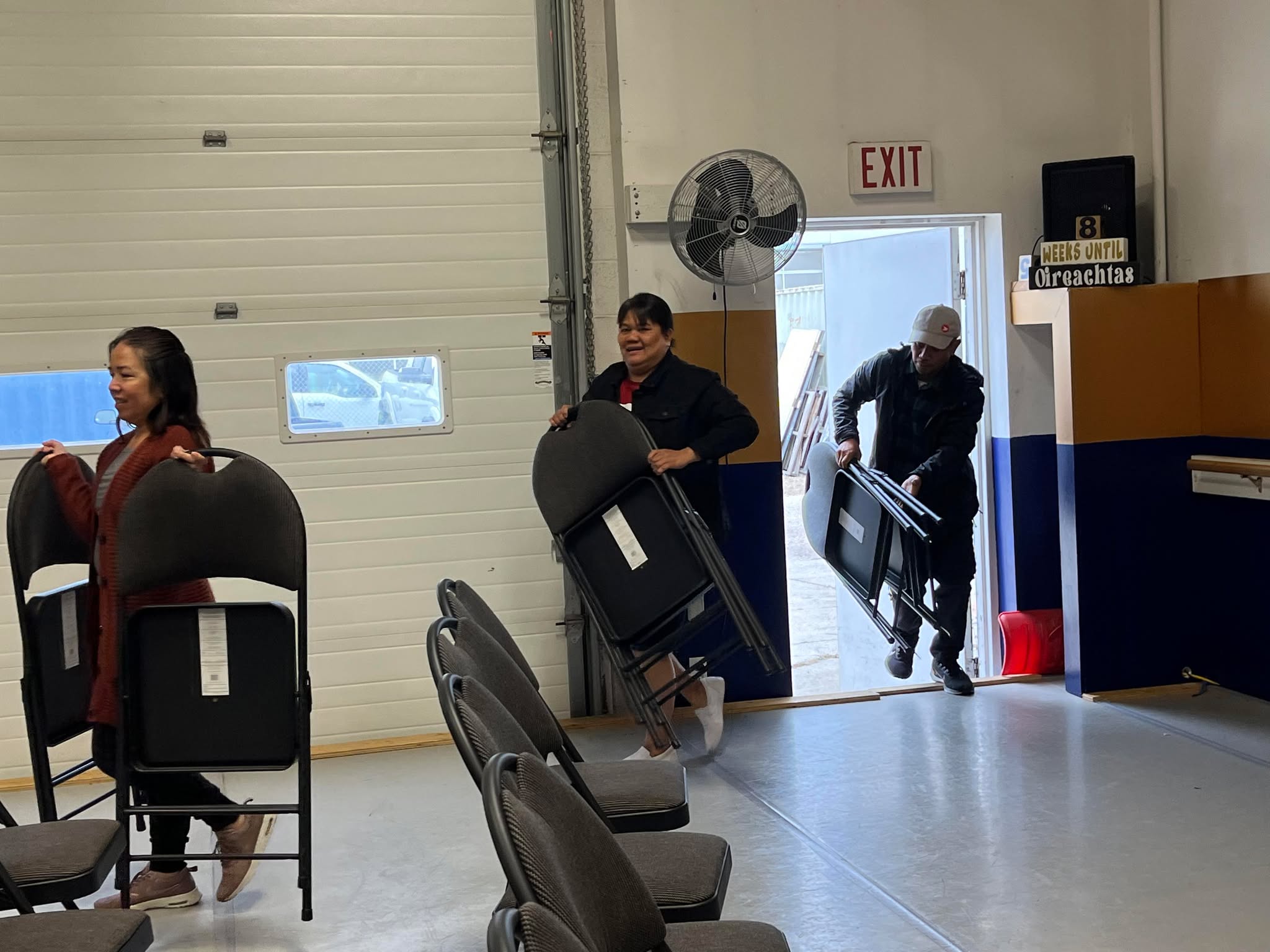 Members bringing in chairs